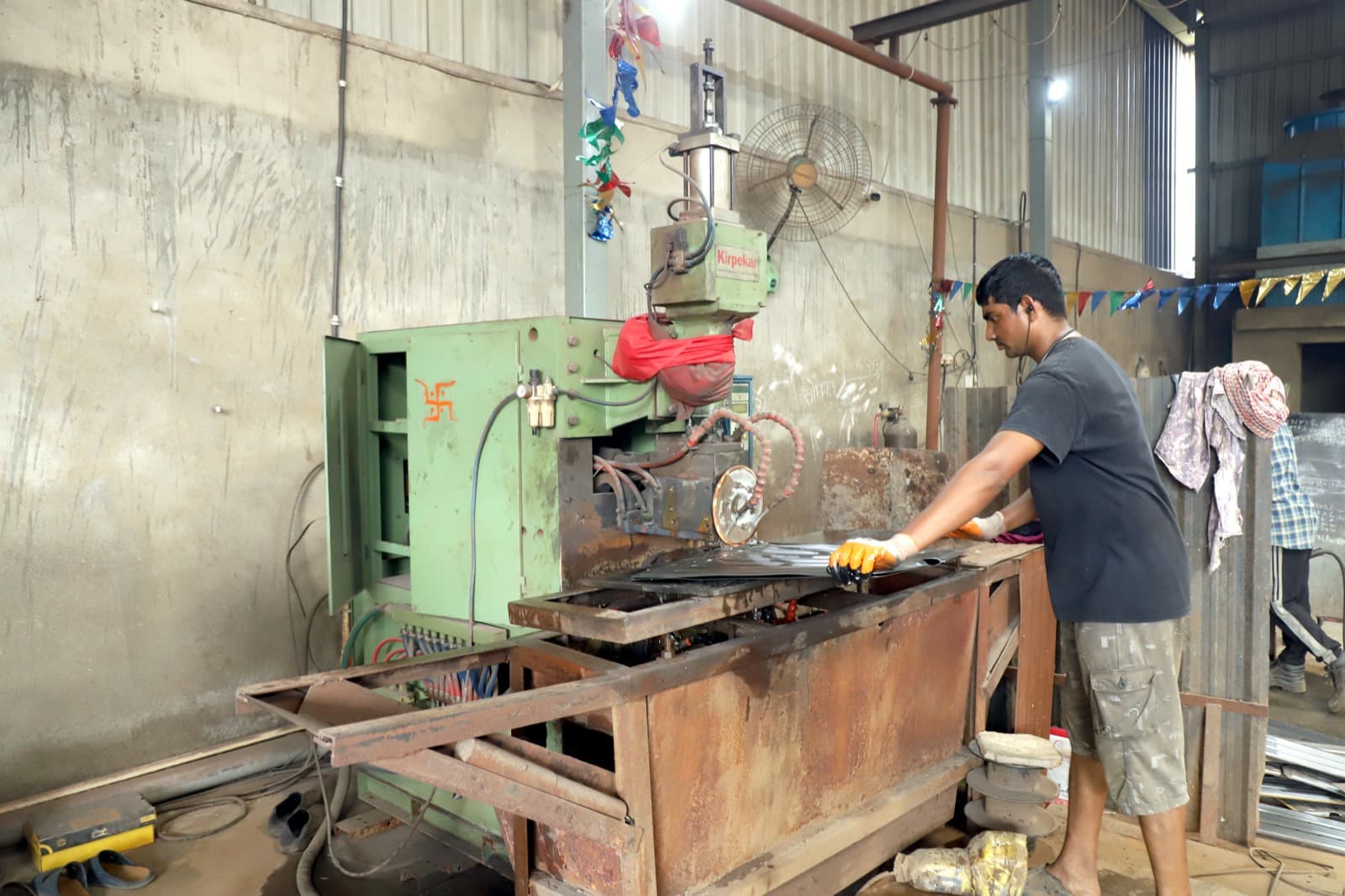 Corrugated transformer radiator panel formed on a spot-seam pressing machine