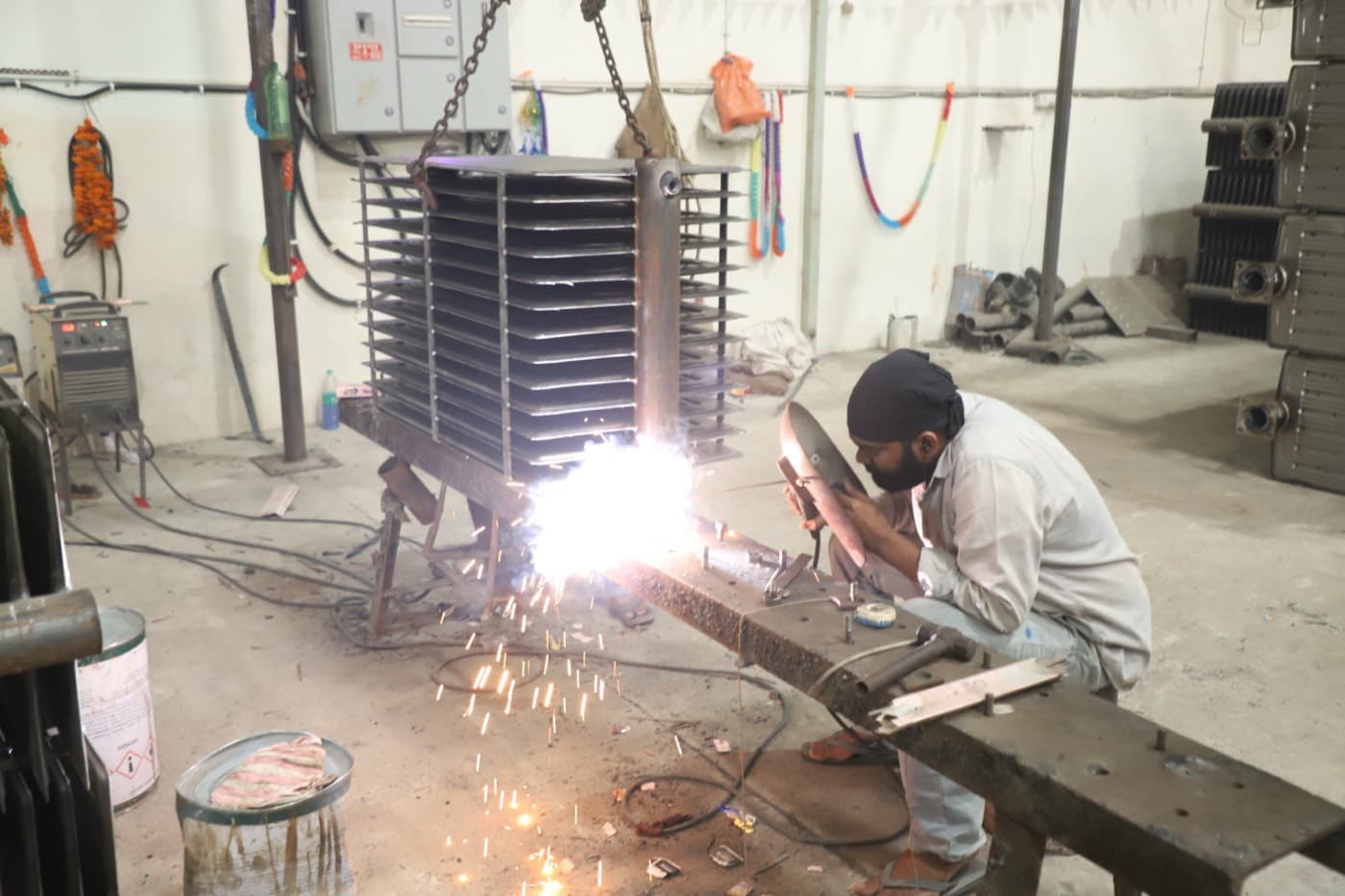 Weld seams being checked on a radiator assembly